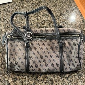 Well loved Dooney & Bourke canvas barrel satchel.